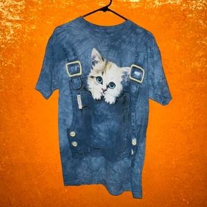 the mountain cat in denim overalls all over blue tie dyed shirt